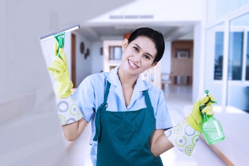 Insured carpet cleaners working carefully with PPE and equipment